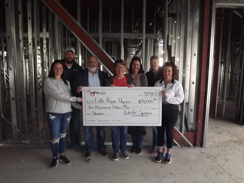 WesTel Systems recently donated $10,000 to the Little Royals Daycare last week at the High School. Left to Right: Amanda Ney, Matt Dreckman, representatives of Westel Bob Gannon & Robin Jenness, Kristi Letsche, Abby Priebe, and Amanda Seuntjens